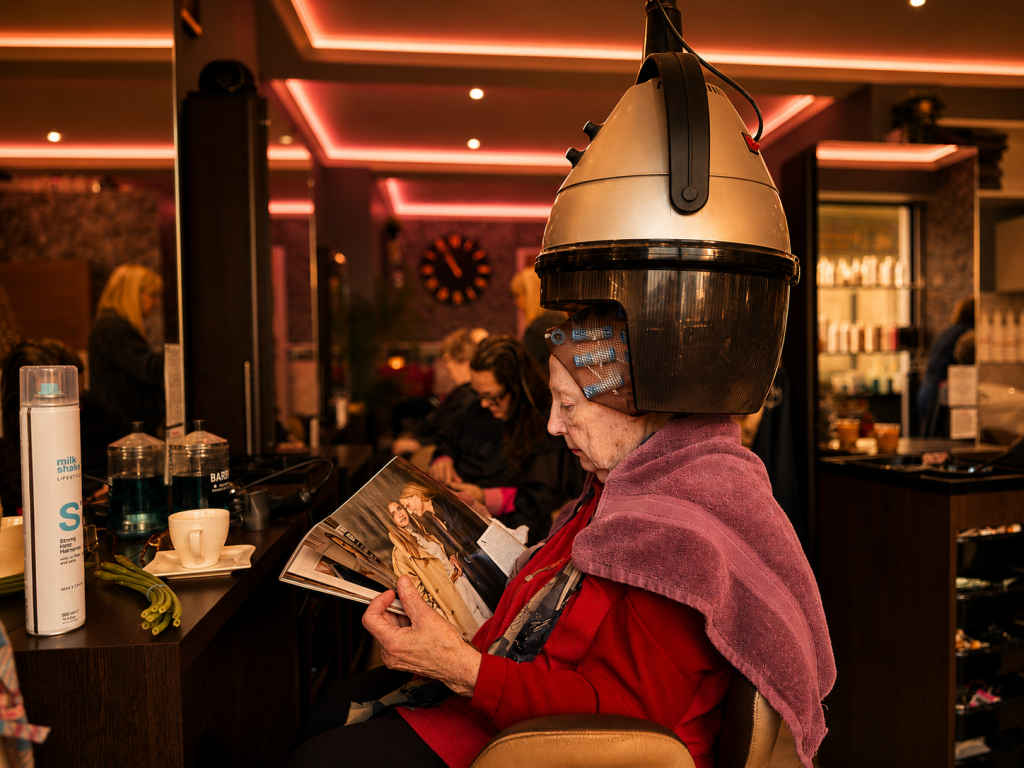 Professional hairstylist applying foils during a hair colouring treatment at Sisters Hair & Beauty salon in Tavistock, Devon.